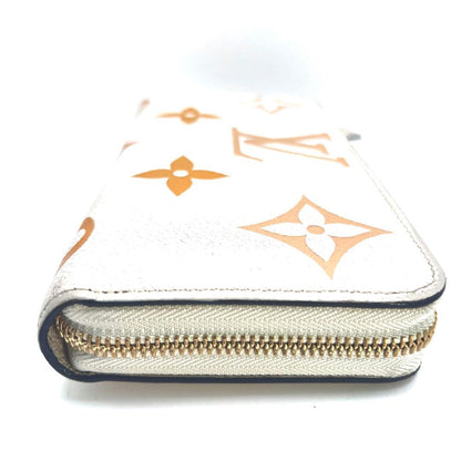 Louis Vuitton Bicolor Monogram Empreinte Cream Saffron Wallet — view 6