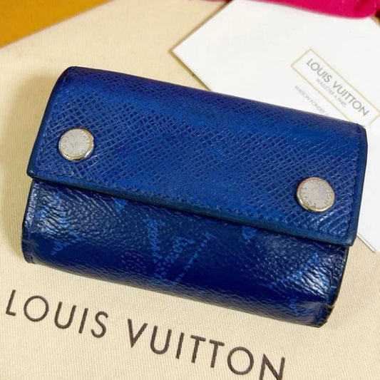Louis Vuitton Discovery Taiga Llama Compact Trifold Wallet