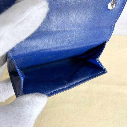 Louis Vuitton Discovery Taiga Llama Compact Trifold Wallet