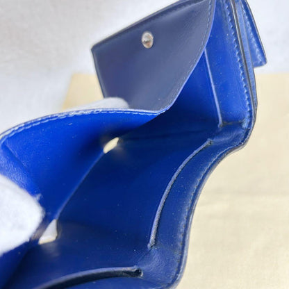 Louis Vuitton Discovery Taiga Llama Compact Trifold Wallet