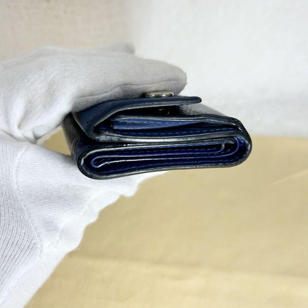 Louis Vuitton Discovery Taiga Llama Compact Trifold Wallet