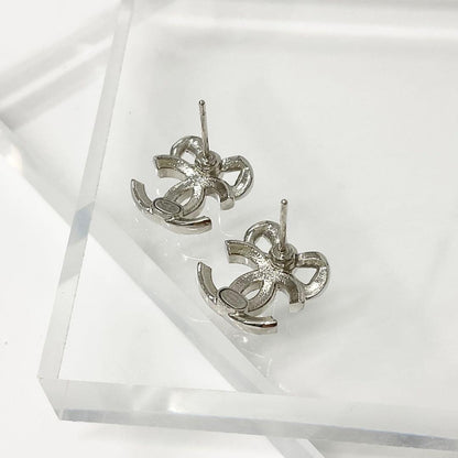 Chanel Cocomark Ribbon Rhinestone Earrings Silver