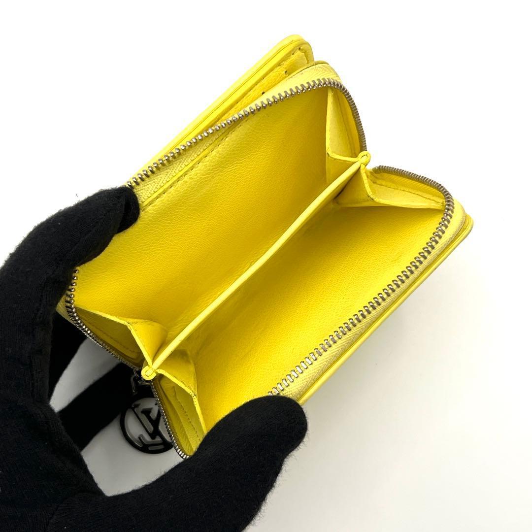 Louis Vuitton Cousin Portefeuille Bifold Wallet Yellow Embossed