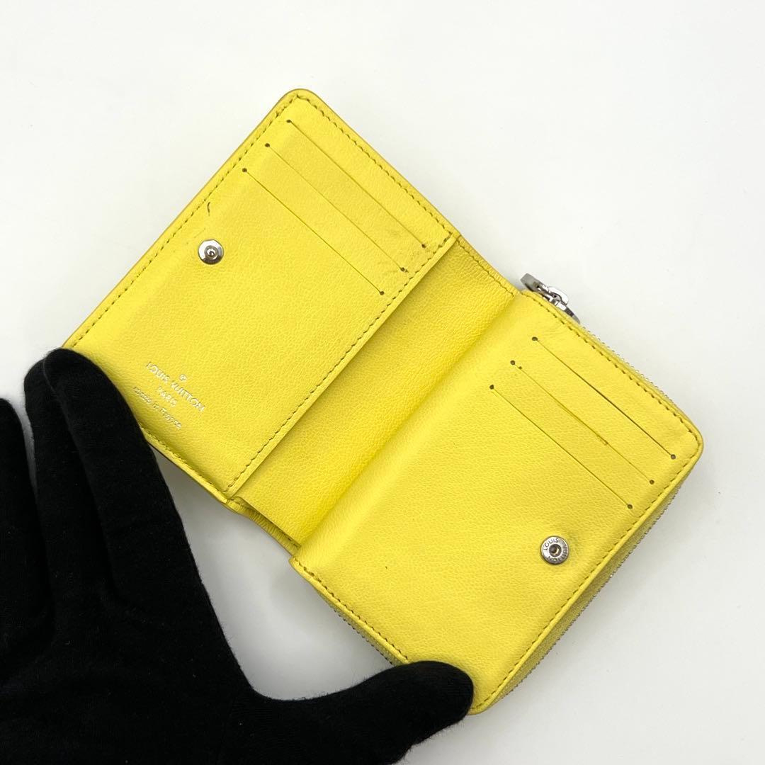Louis Vuitton Cousin Portefeuille Bifold Wallet Yellow Embossed