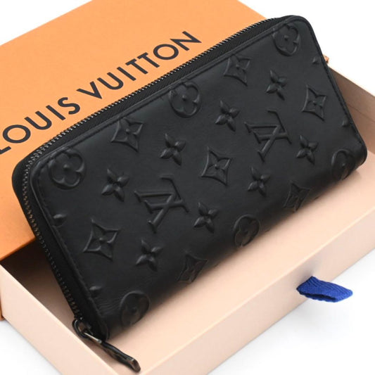 Louis Vuitton Monogram Seal Zippy Wallet Vertical Black
