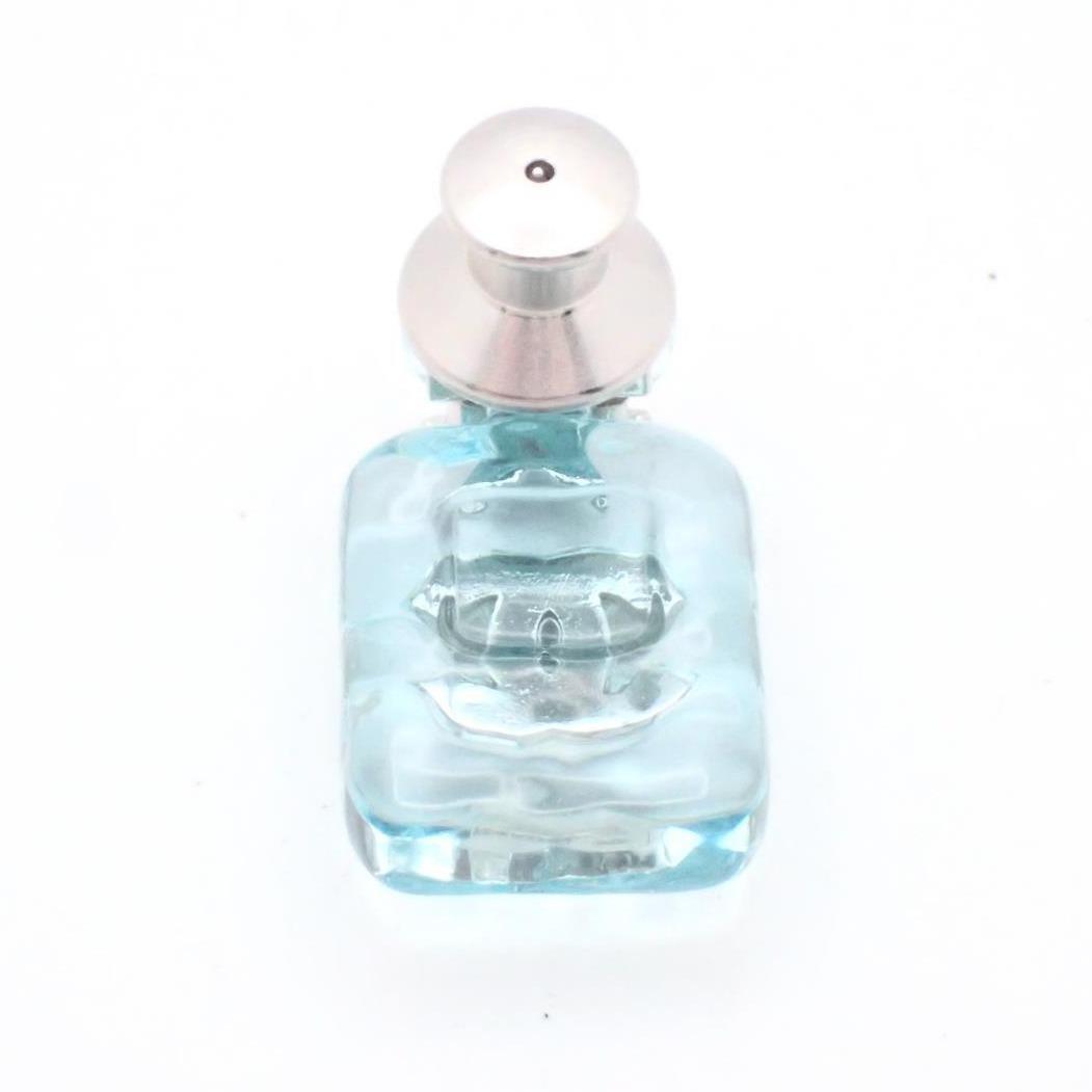 Chanel CC Logo Brooch Perfume Bottle Star Comet