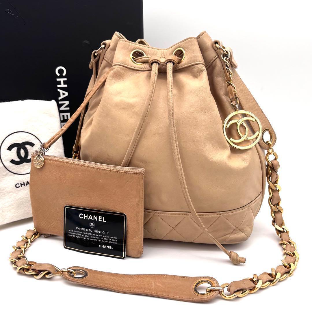 Chanel CC Logo Lambskin Drawstring Shoulder Bag Beige Flesh