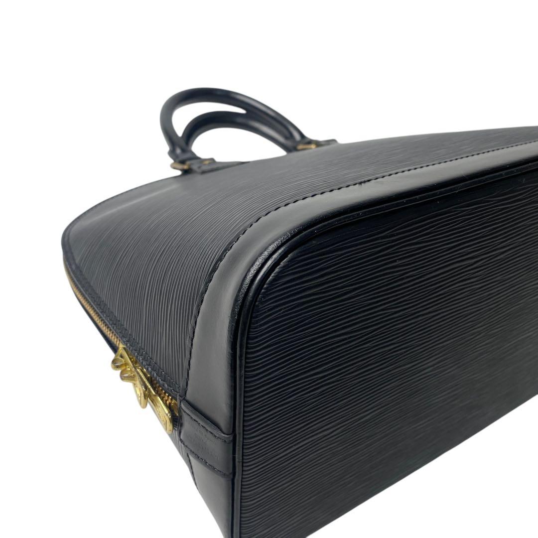 Vuitton Louis Vuitton Epi Alma Handbag With Keys And Cadenas