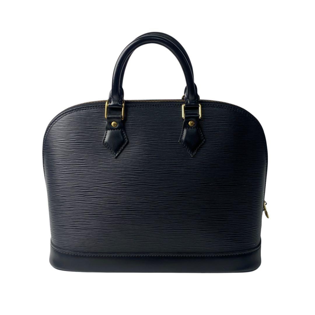 Vuitton Louis Vuitton Epi Alma Handbag With Keys And Cadenas