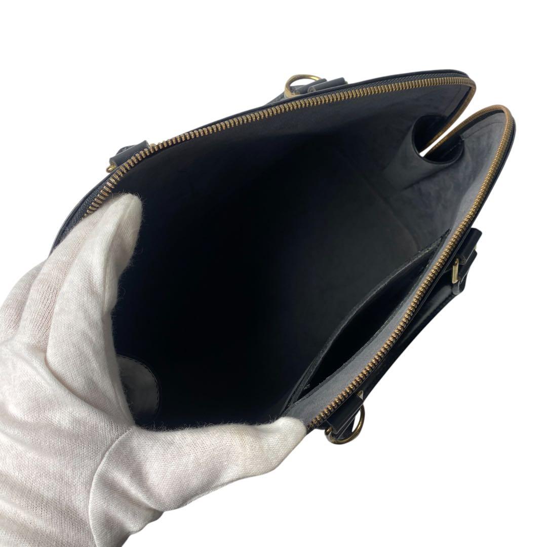 Vuitton Louis Vuitton Epi Alma Handbag With Keys And Cadenas