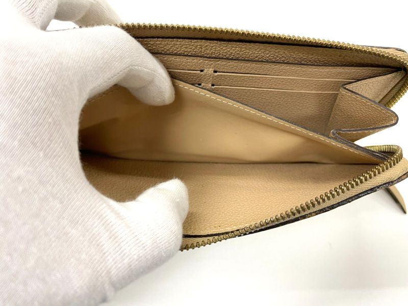 Louis Vuitton Monogram Empreinte Portefeuille Clemence Round Zipped Wallet Long