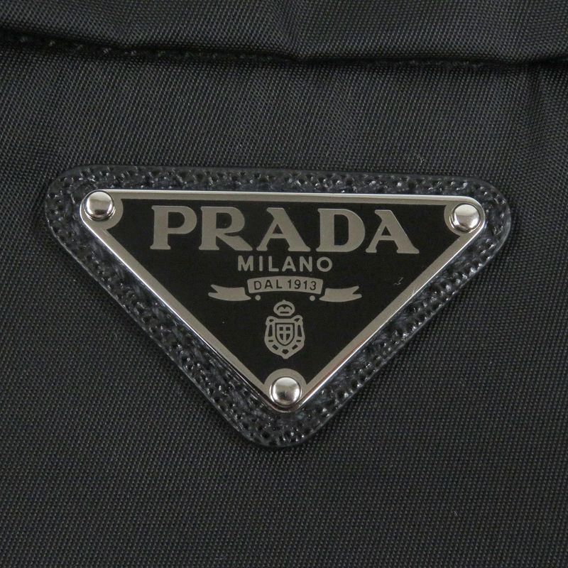 Prada 2vz048 Re-nylon Saffiano Leather Triangle Logo Triangle Plate Backpack