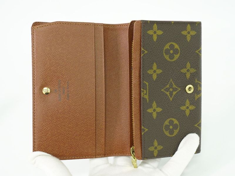 Authentic Louis Vuitton LV Porte Monet Vier Trésor Monogram Fold Wallet Brown