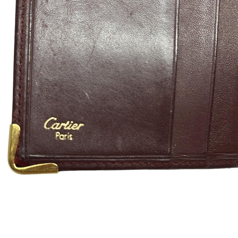 Cartier Bold And Gold Leather Wallet With Two Compartments