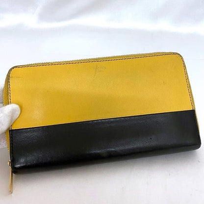 Celine Round Zipper Long Wallet Yellow Black Bicolor Wallet