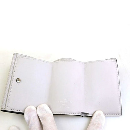 Louis Vuitton Trifold Wallet Taiga Llama Discovery Compact M67621 39fa050