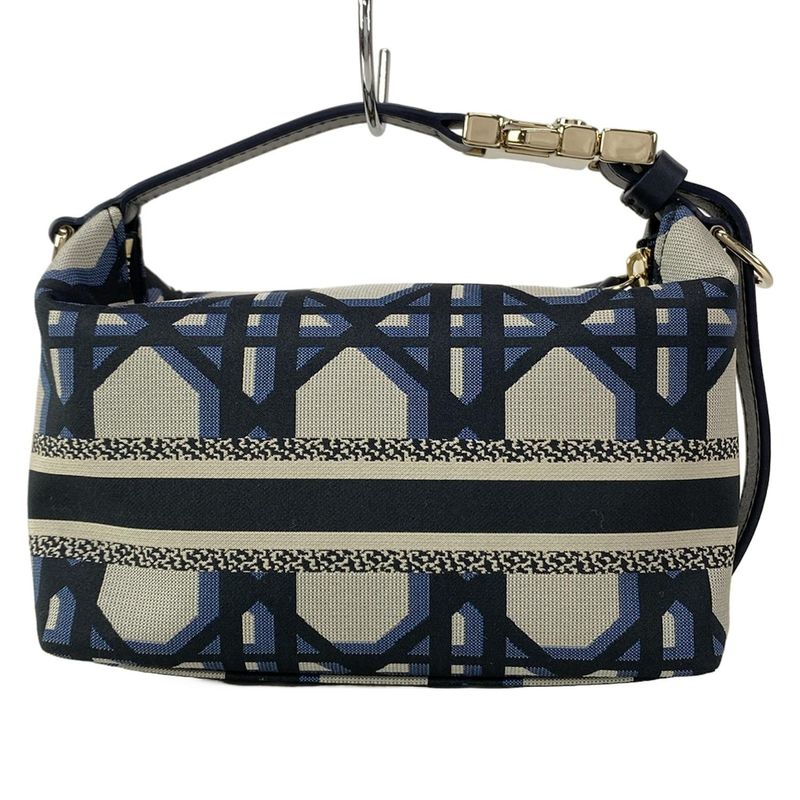 Dior/christian Dior Handbag Diortravel Nomad Pouch Navy And Beige Leather