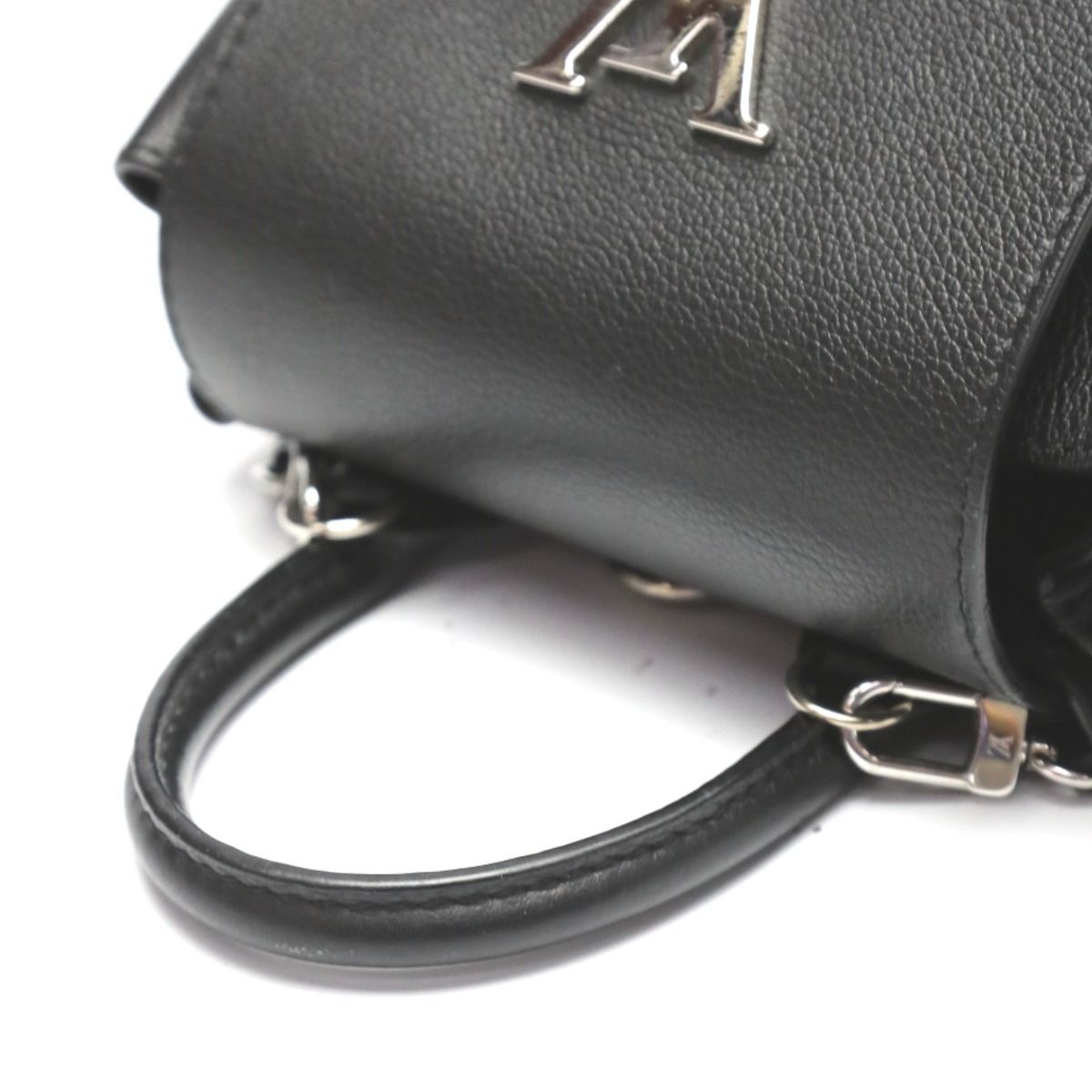 Louis Vuitton Taurillon Lock Me Bag Mini Backpack Daypack