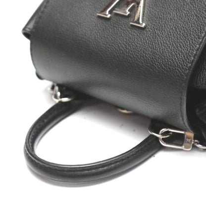 Louis Vuitton Taurillon Lock Me Bag Mini Backpack Daypack