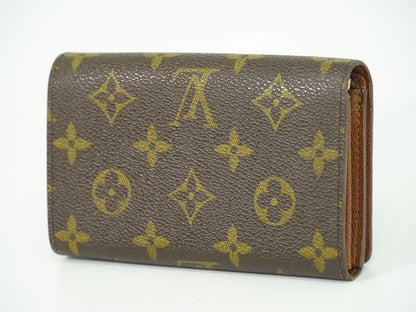 Authentic Louis Vuitton LV Porte Monet Vier Trésor Monogram Fold Wallet Brown