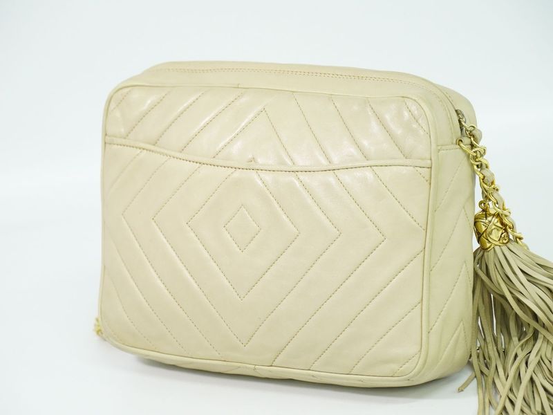 Authentic Chanel Coco Mark Tassel Shoulder Bag Pochette Lambskin Leather Beige
