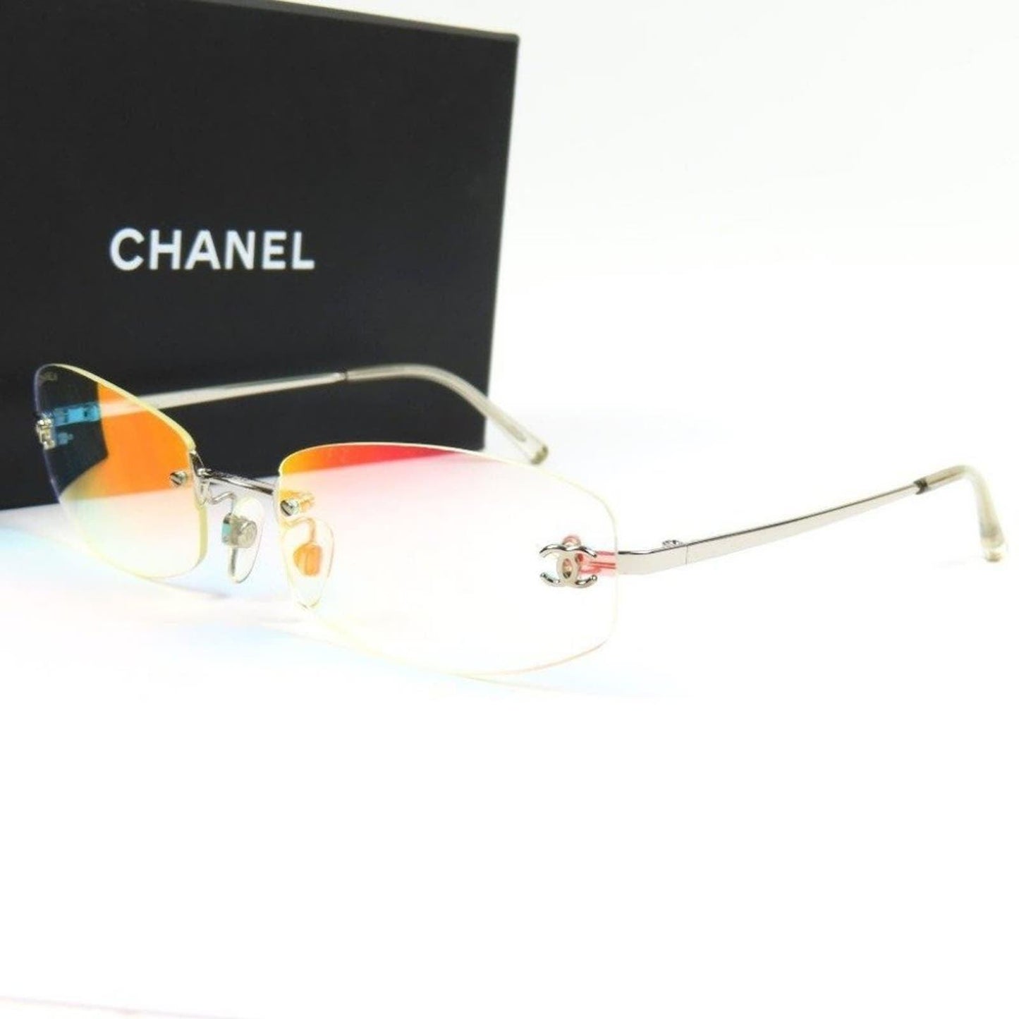 RARE Chanel Vintage Sunglasses Crystal CC Logo Rimless Gradient Iridescent Y2K - The Reluxe