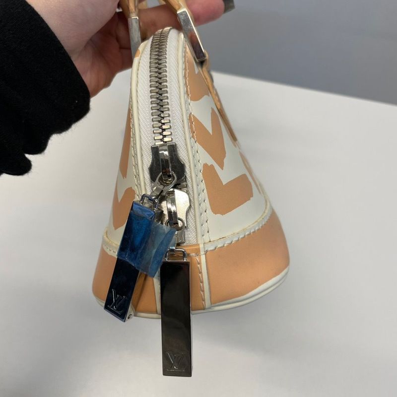 Louis Vuitton Alma Oriental Handbag