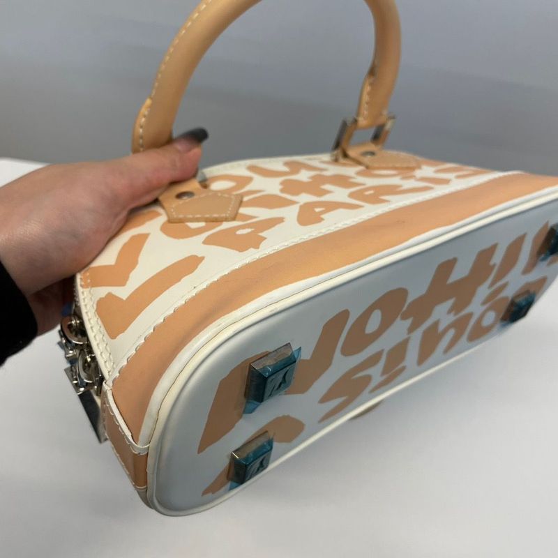 Louis Vuitton Alma Oriental Handbag
