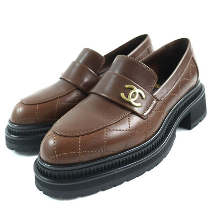 CHANEL 23A G45074 Coco Mark Matelasse Thick Soled Leather Loafers Brown Black