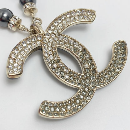 Chanel Coco Mark Rhinestone X Fake Pearl Necklace C23p Champagne Gold/black