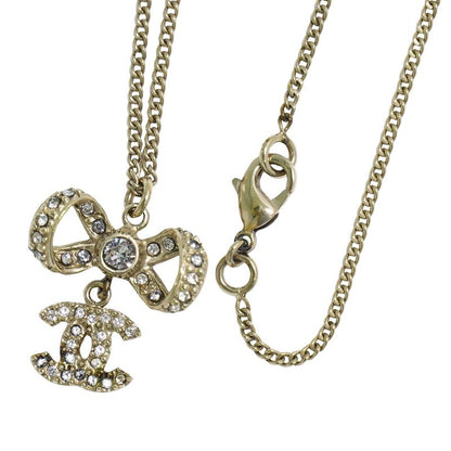 Authentic Chanel Coco Mark Ribbon Motif Rhinestone Necklace Pendant GP Gold