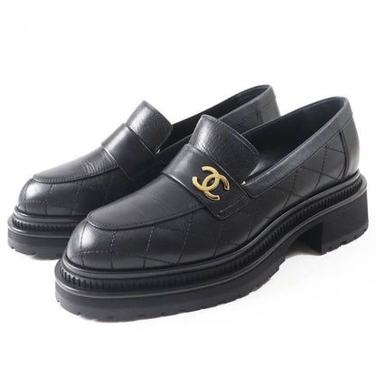 CHANEL 23A G45074 Matelasse Coco Mark Leather Loafers Black Gold Hardware 39.5