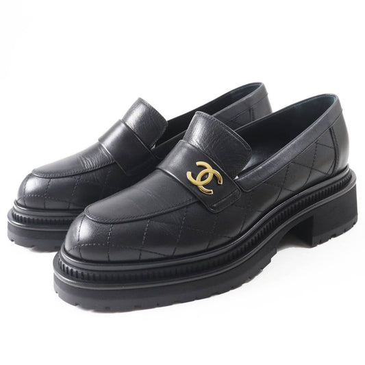 CHANEL 23A G45074 Matelasse Coco Mark Leather Loafers Black Gold Hardware 39.5