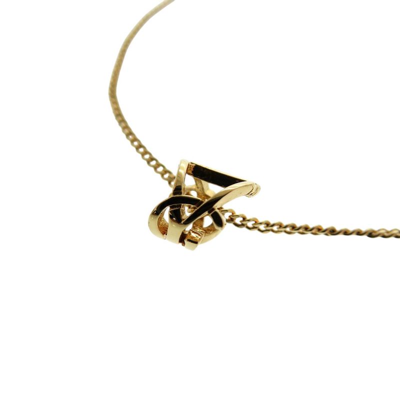 Yves Saint Laurent Opium Monogram Twisted Cassandra Bracelet GP Gold Bracelet