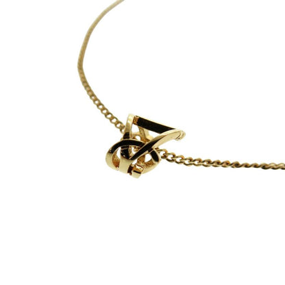 Yves Saint Laurent Opium Monogram Twisted Cassandra Bracelet GP Gold Bracelet