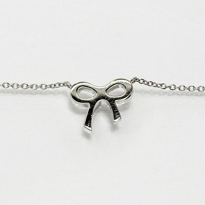 Tiffany & Co 18k Diamond Necklace Metro Bow Mini Pendant White Gold
