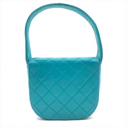 Chanel CC Logo Turnlock Quilted Lambskin Mini Hand Vanity Bag Blue