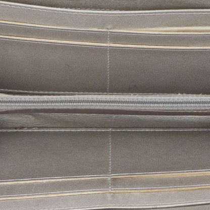 Chanel Coco Mark Camelia Embossed Round Zip Wallet Women