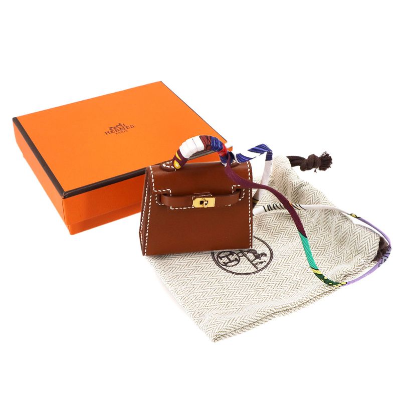 Exhibit Hermes Kelly Twilly Mini Bag Charm Tadelakt Fauve W Engraved Kelly