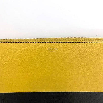 Celine Round Zipper Long Wallet Yellow Black Bicolor Wallet