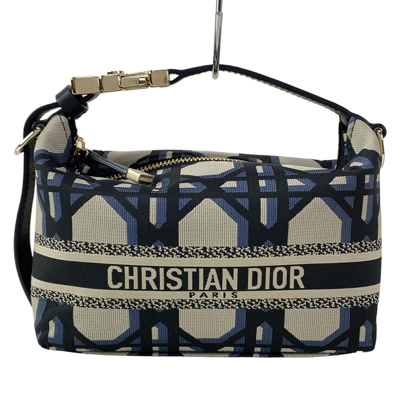 Dior/christian Dior Handbag Diortravel Nomad Pouch Navy And Beige Leather