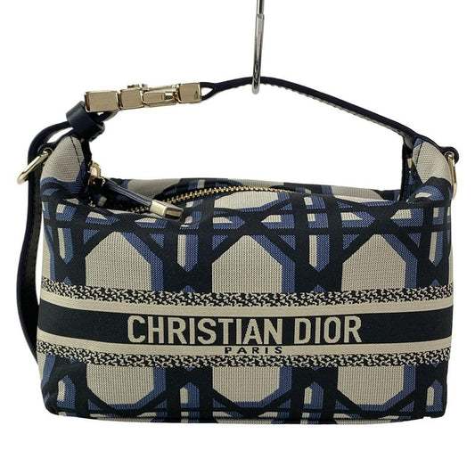 Dior/christian Dior Handbag Diortravel Nomad Pouch Navy And Beige Leather