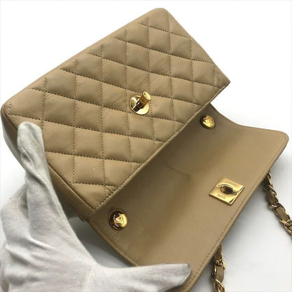 Chanel CC Logo Mini Quilted Turnlock Shoulder Bag Beige