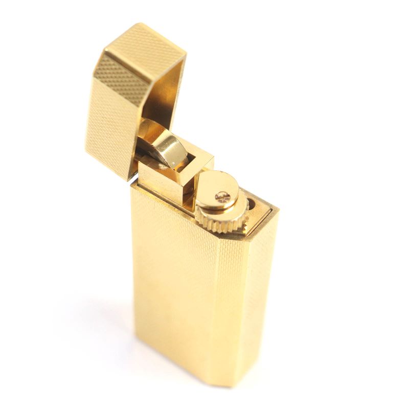 Cartier Pentagonal Roller Smoking Tool Gas Lighter Gold Swiss Made Men's