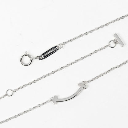 Tiffany & Co T-smile Mini 18K White Gold And Pink Sapphire Ladies 2.43g Necklace